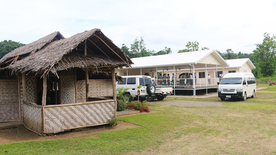 Bush-chapel-in-foreground-and-new-meetinghouse-in-background.-Papua-New-Guinea.-January-2025.